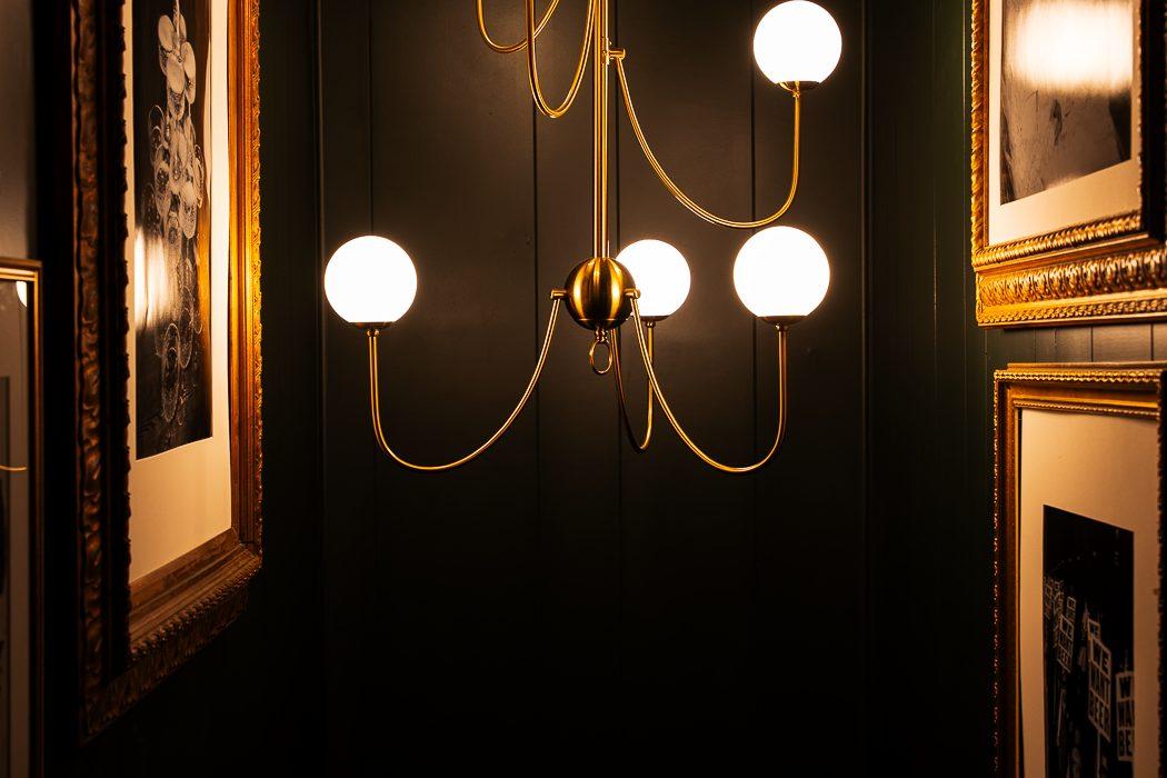 Chandelier and gallery wall